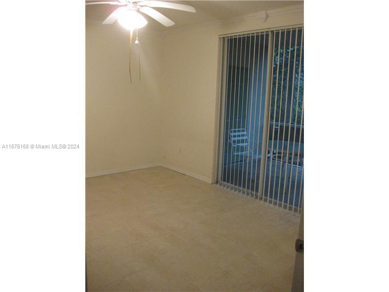 6894 West Sample Road, Unit 6894 Coral Springs, FL 33067 - Photo 16 of 18 a view of a room with a small space
