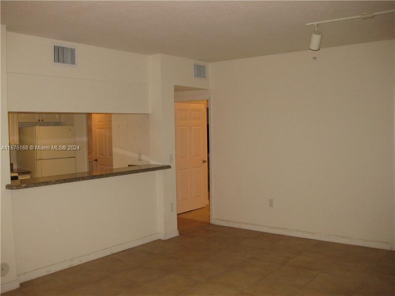 6894 West Sample Road, Unit 6894 Coral Springs, FL 33067 - Photo 18 of 18 a view of an empty room