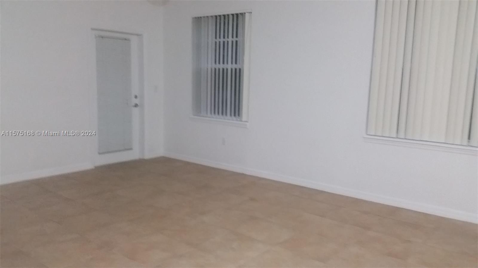 6894 West Sample Road, Unit 6894 Coral Springs, FL 33067 - Photo 6 of 18 a view of empty room