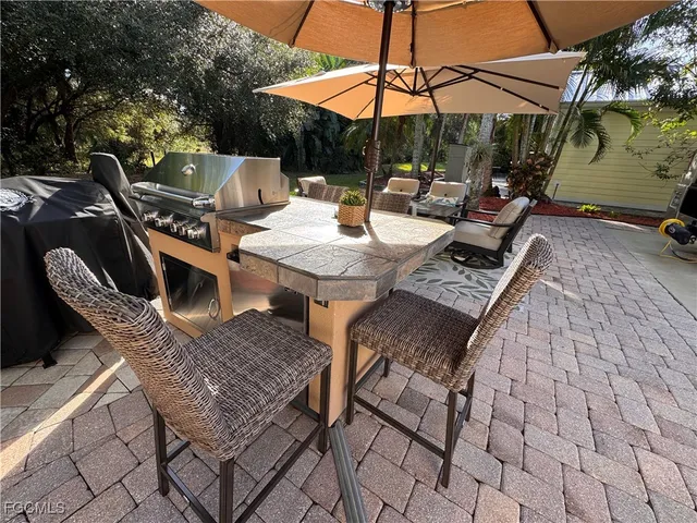 a view of a couches in the patio of the house