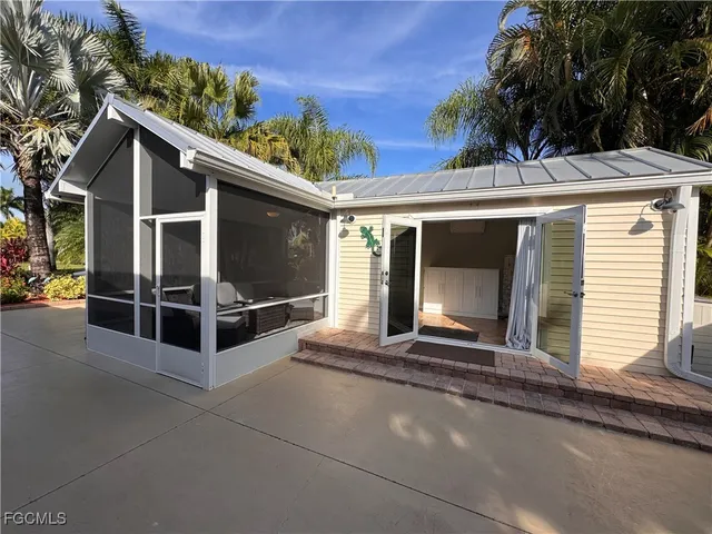 a view of house with outdoor space and porch