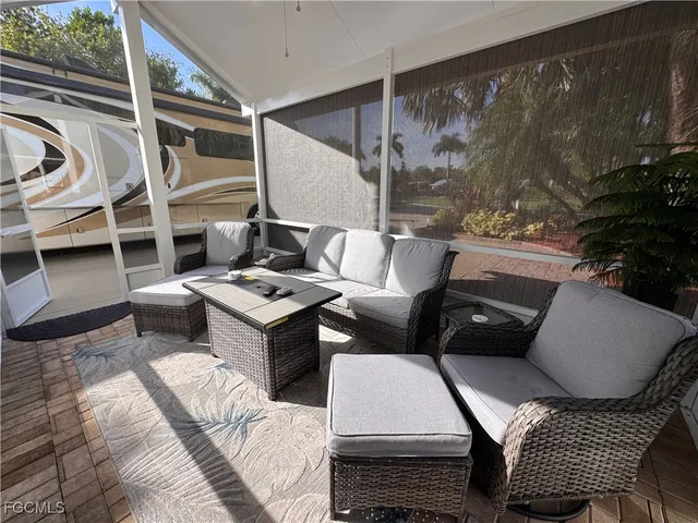 a living room with a couch and a flat screen tv