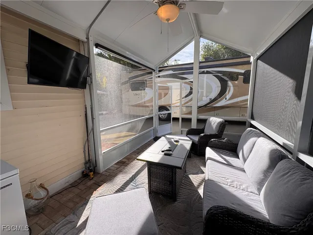 a bathroom with a toilet a sink and a mirror