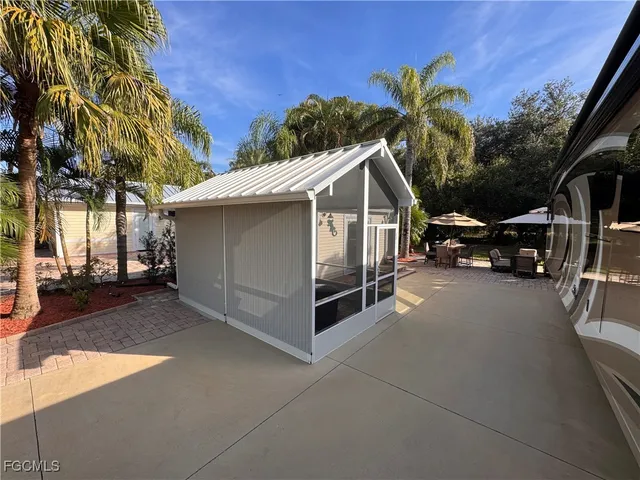 a view of a car park in front of house