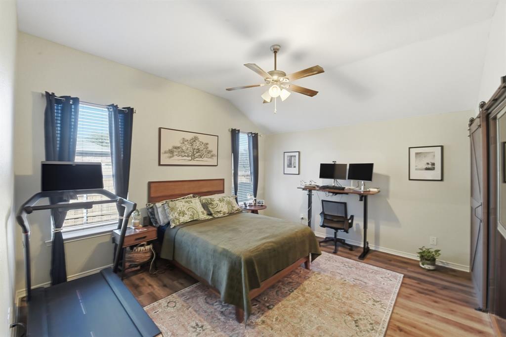 3701 Fiscal Court Fort Worth, TX 76244 - Photo 15 of 29 a bedroom with a bed and a window