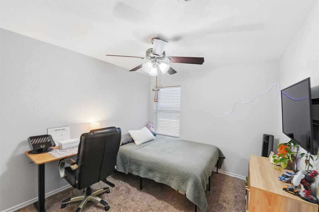 3701 Fiscal Court Fort Worth, TX 76244 - Photo 20 of 29 a bedroom with a workspace