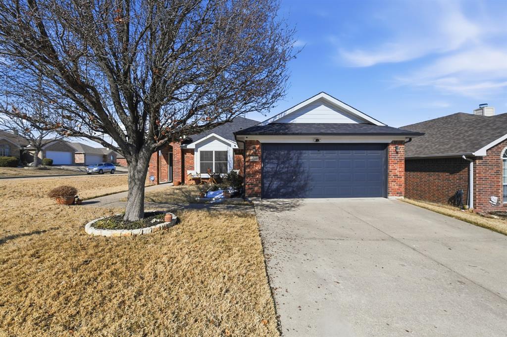 3701 Fiscal Court Fort Worth, TX 76244 - Photo 3 of 29 a front view of a house with a yard