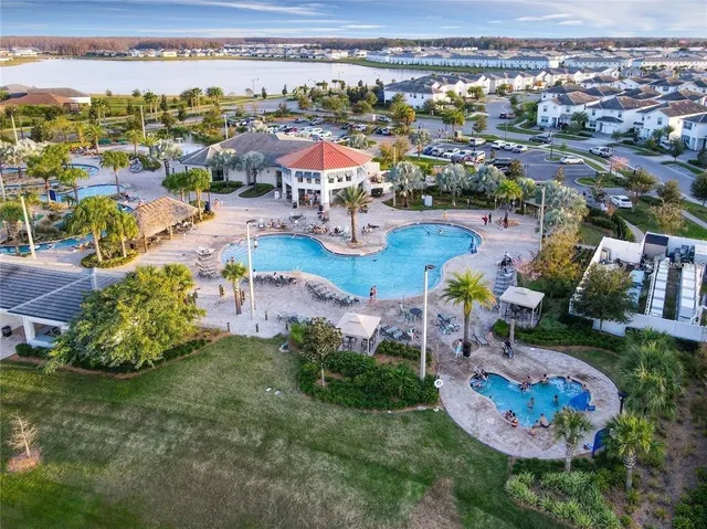 an aerial view of a house with a garden