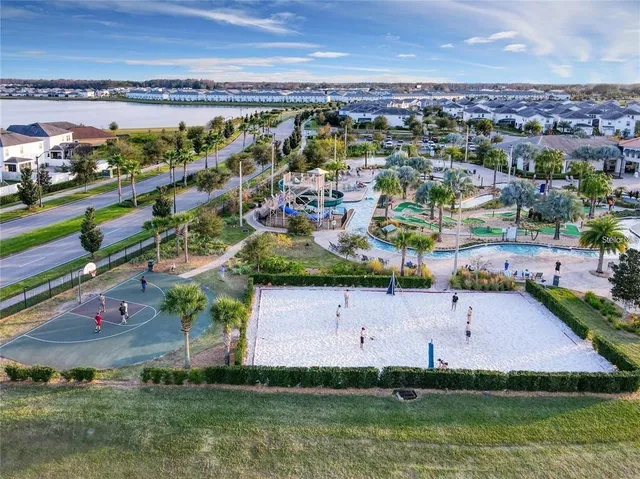 a kitchen with granite countertop a dining table and chairs