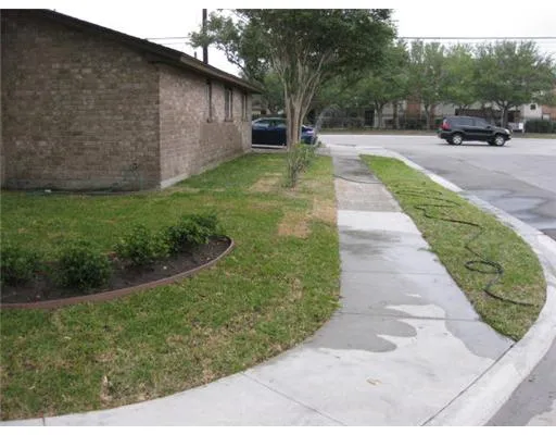 a view of a back yard of the house