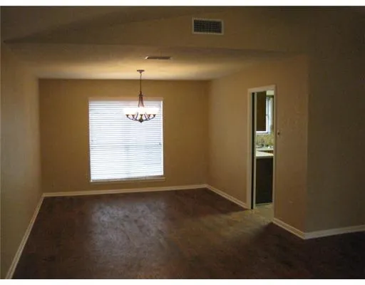 a view of a livingroom with a window
