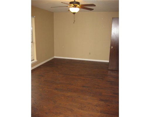 6901 Edgebrook Drive Corpus Christi, TX 78413 - Photo 8 of 10 a view of an empty room with a fan