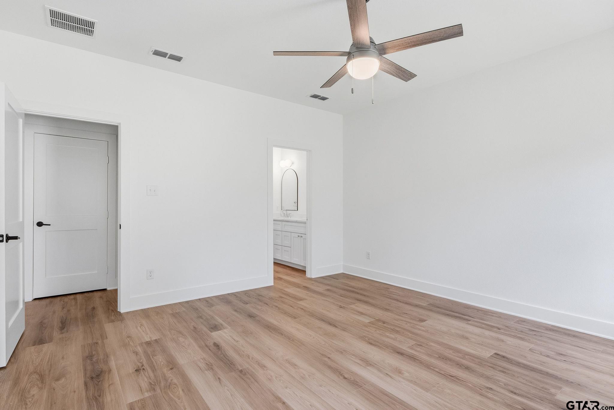 2968 Calloway Road Tyler, TX 75701 - Photo 10 of 24 wooden floor in an empty room
