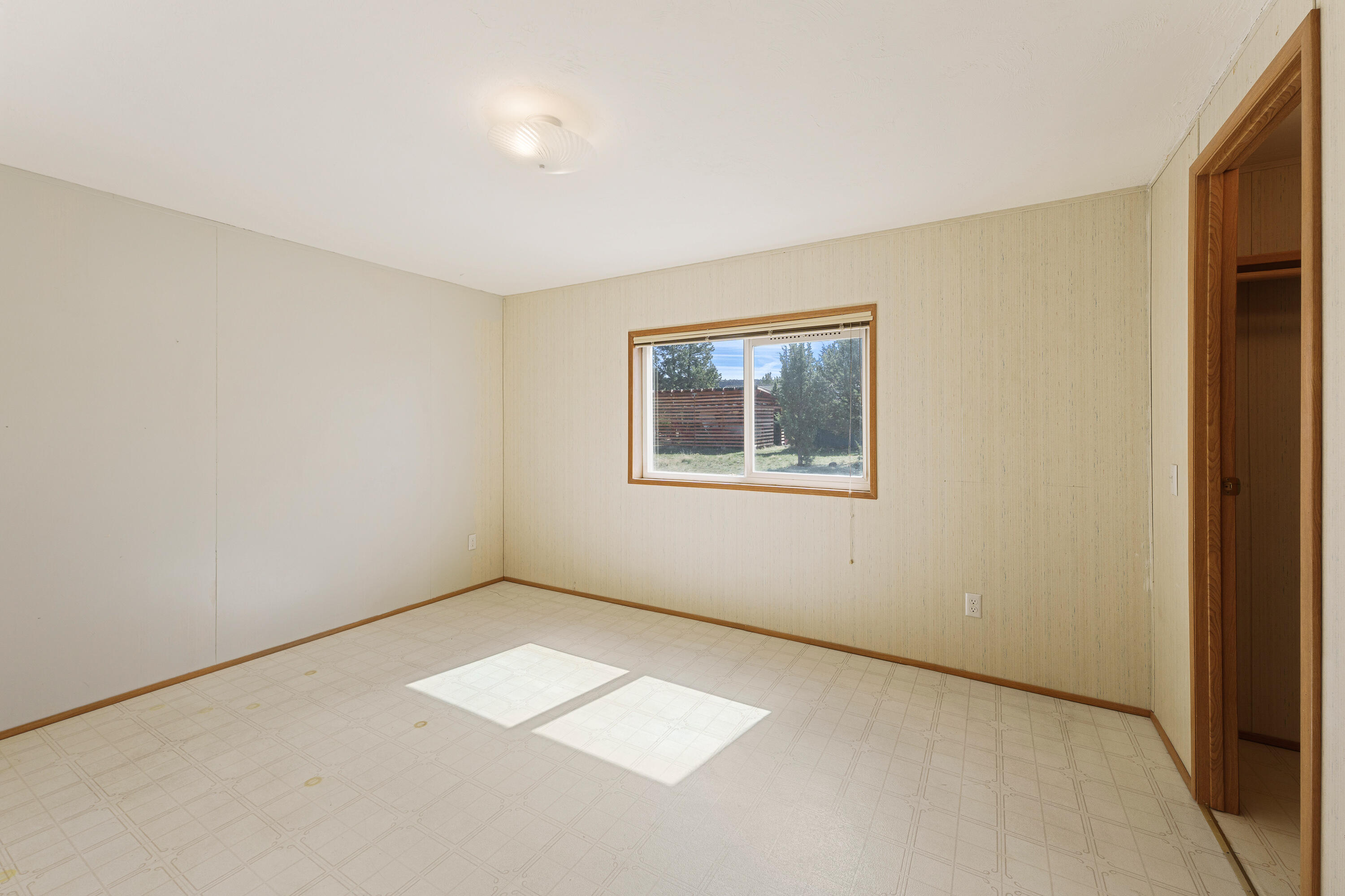 5674 Southeast Davis Loop Prineville, OR 97754 - Photo 25 of 48 an empty room with windows