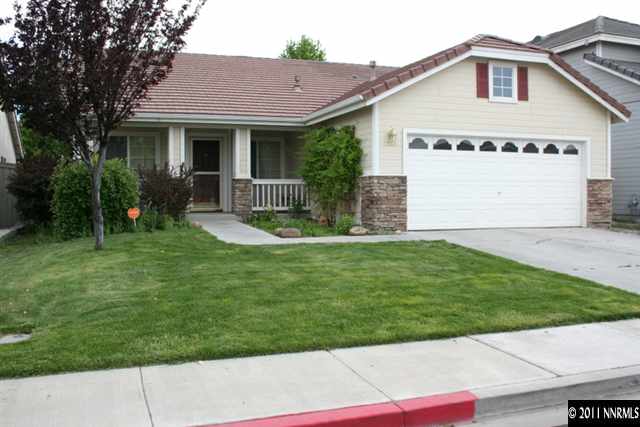 1660 Westmont Lane Reno, NV 89521 - Photo 1 of 1 a view of a house with a yard