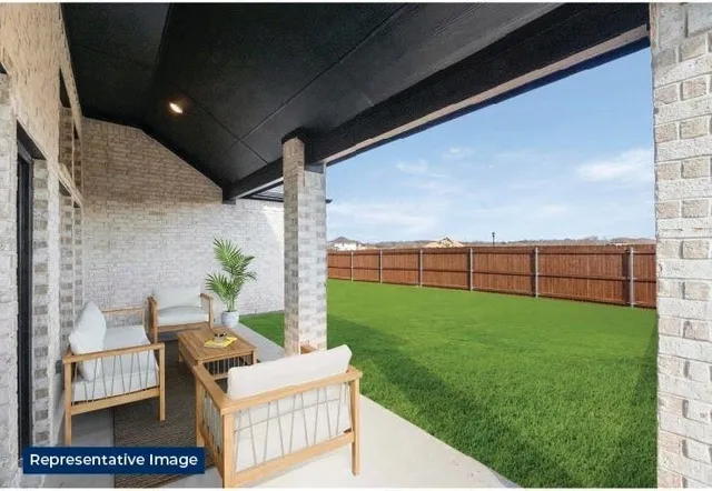 a view of backyard with hardwood