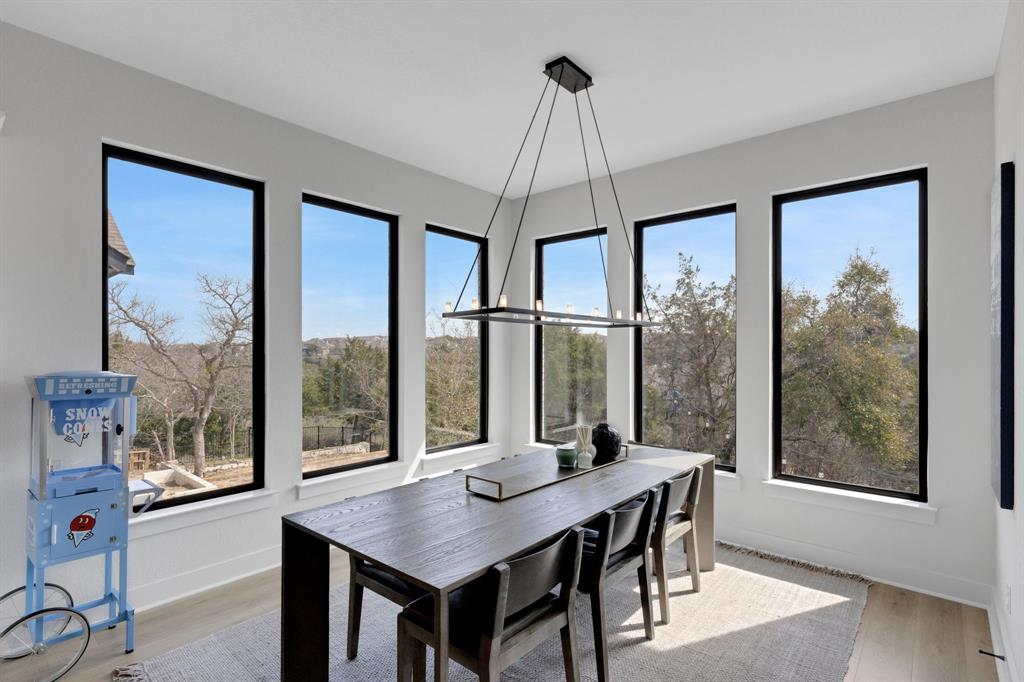 325 Cumberland Cove Georgetown, TX 78628 - Photo 12 of 39 a view of a dining room with furniture window and wooden floor