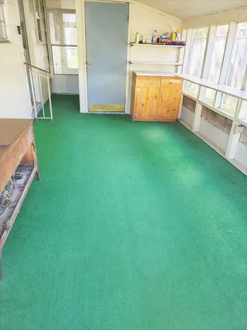 a view of a backyard with a tub