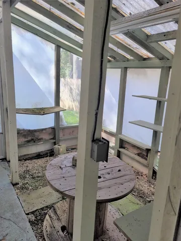 a view of living room filled with furniture