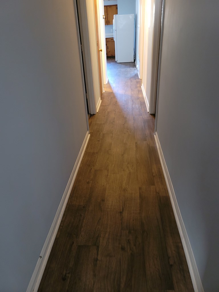 2855 Barbara Road Columbus, GA 31907 - Photo 7 of 17 a view of a hallway with wooden floor