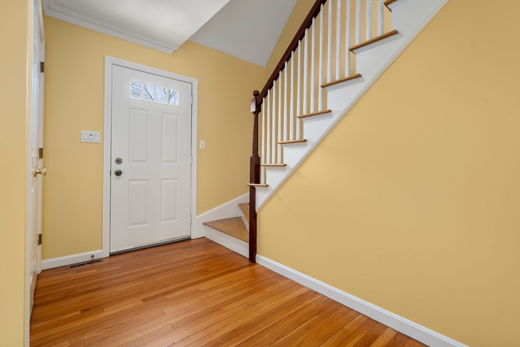 173 Conant Road Weston, MA 02493 - Photo 13 of 25 a view of an entryway with wooden floor