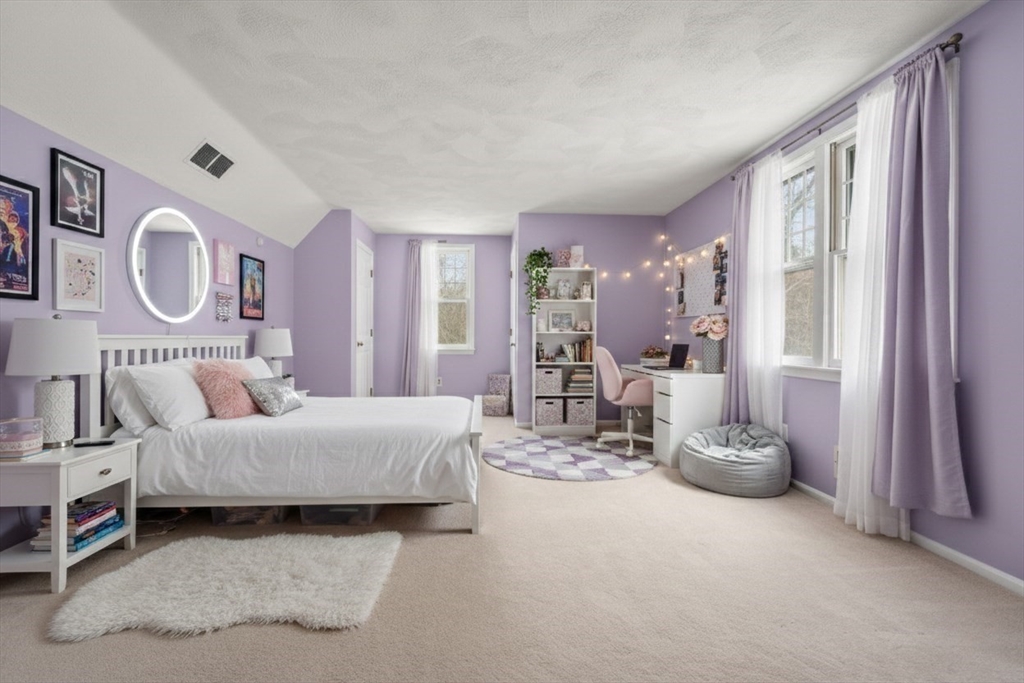 173 Conant Road Weston, MA 02493 - Photo 19 of 25 a living room with furniture and large windows