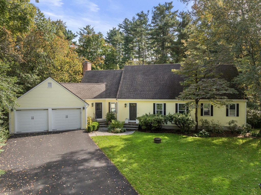 173 Conant Road Weston, MA 02493 - Photo 2 of 25 a view of a house with a garden
