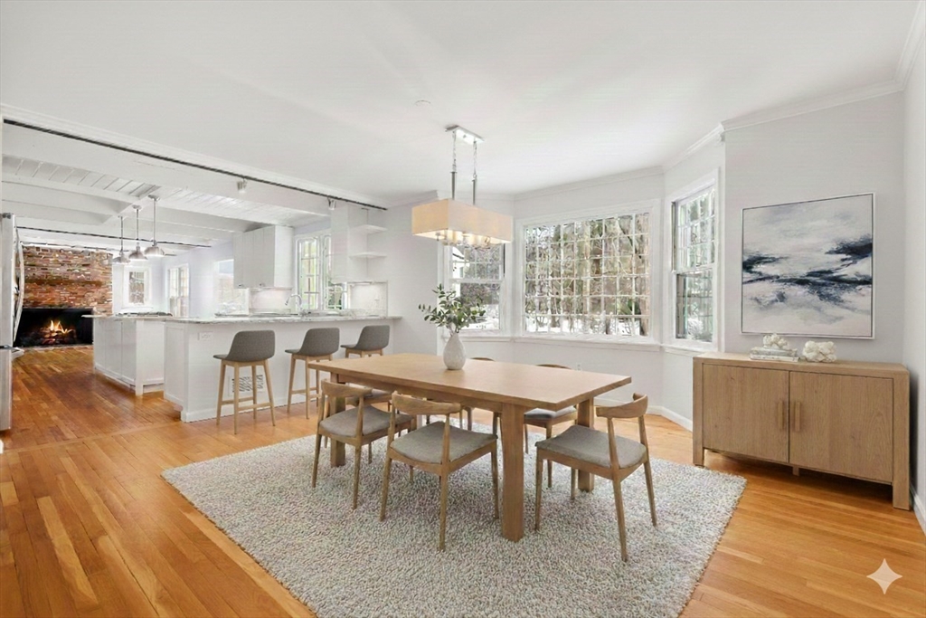173 Conant Road Weston, MA 02493 - Photo 7 of 25 a view of a dining room with furniture window and wooden floor