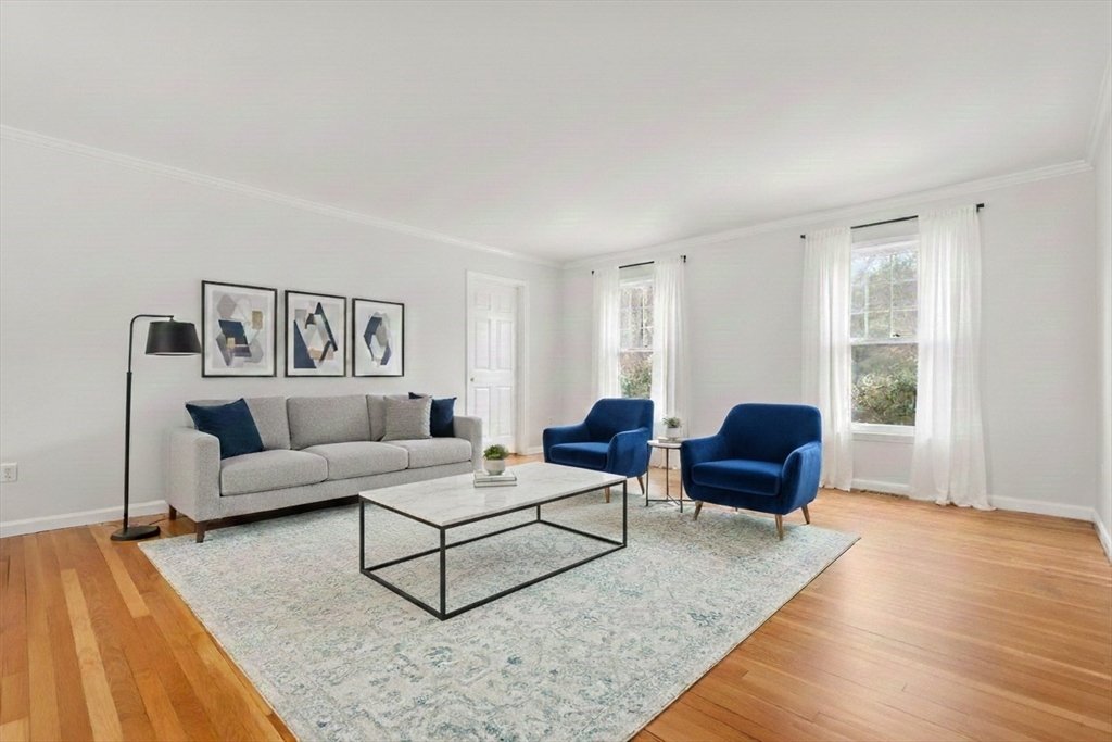 173 Conant Road Weston, MA 02493 - Photo 9 of 25 a living room with furniture rug and wooden floor