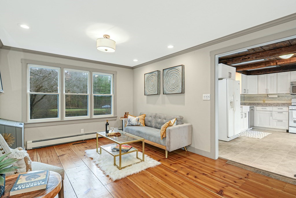 30 Nourse Road Bolton, MA 01740 - Photo 14 of 40 a living room with furniture and a window