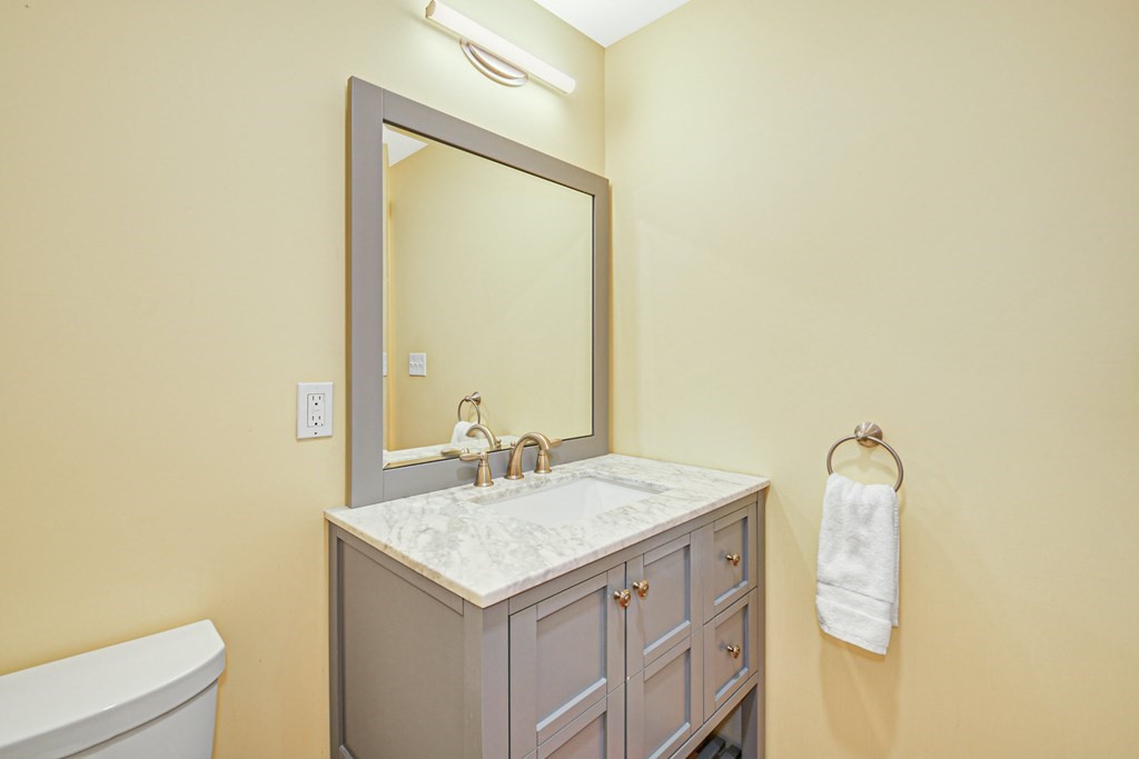 30 Nourse Road Bolton, MA 01740 - Photo 20 of 40 a bathroom with a sink and a mirror