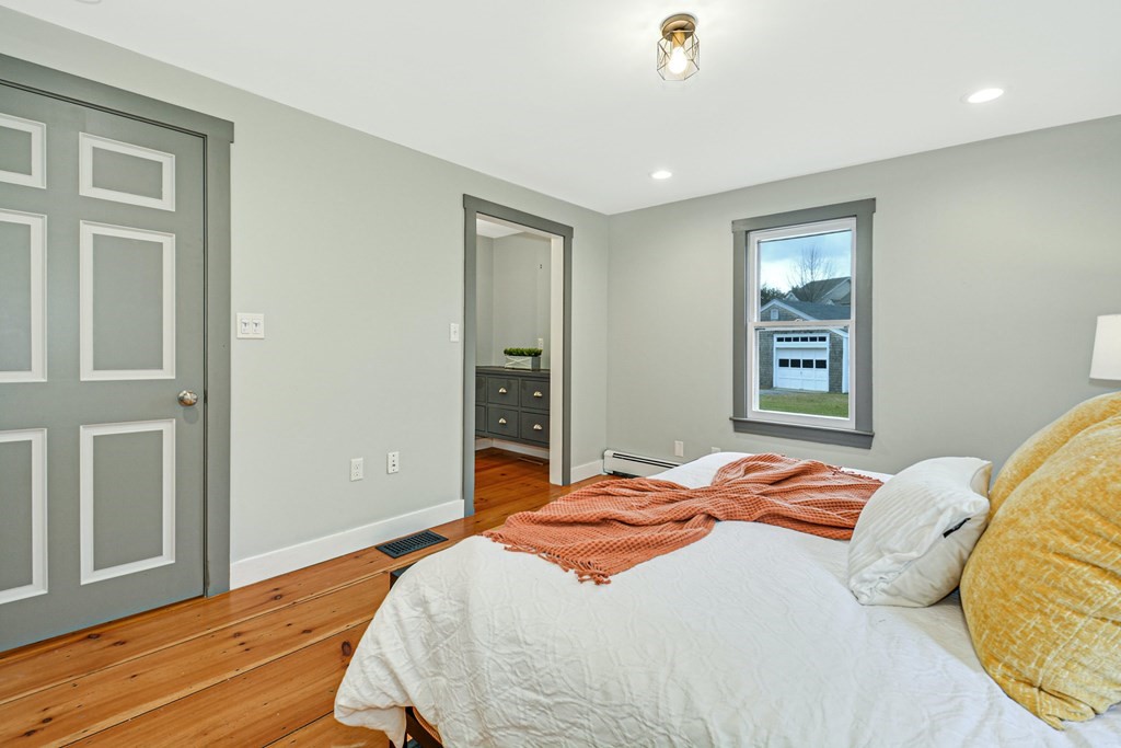 30 Nourse Road Bolton, MA 01740 - Photo 22 of 40 a bedroom with a bed and a window