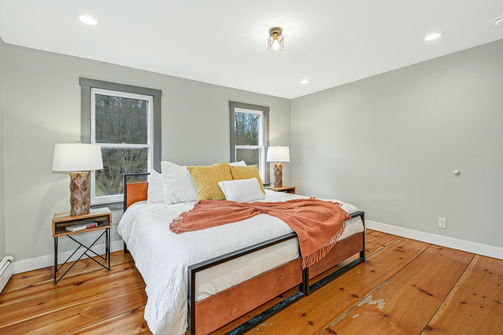 30 Nourse Road Bolton, MA 01740 - Photo 23 of 40 a bedroom with bed and window