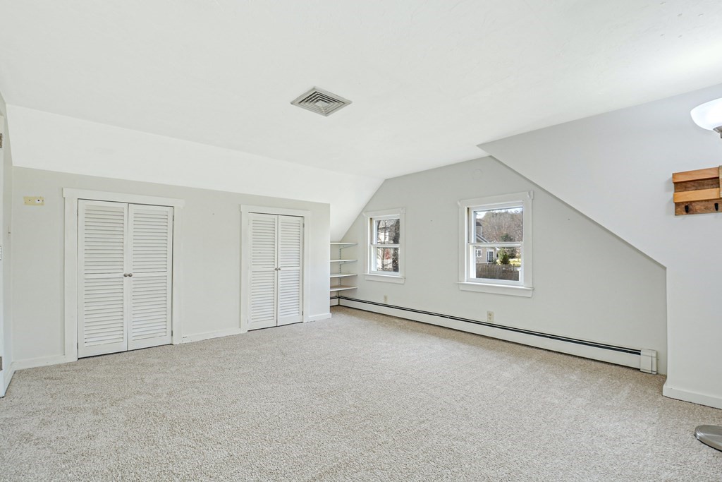30 Nourse Road Bolton, MA 01740 - Photo 29 of 40 an empty room with windows and closet