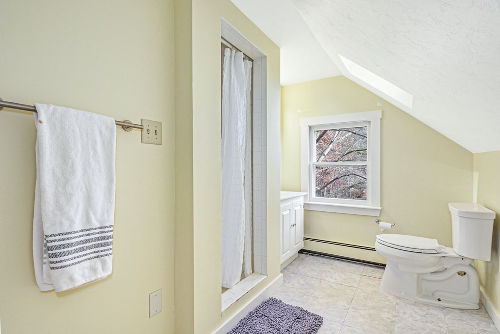 30 Nourse Road Bolton, MA 01740 - Photo 30 of 40 a bathroom with a sink toilet and shower