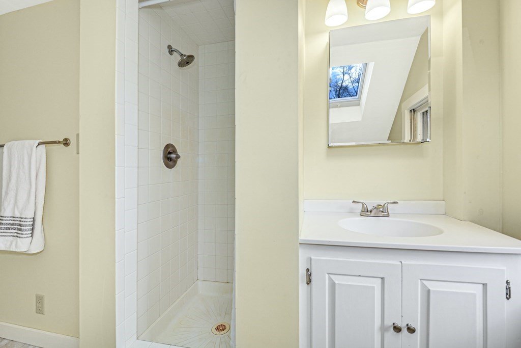 30 Nourse Road Bolton, MA 01740 - Photo 31 of 40 a bathroom with a sink and a mirror