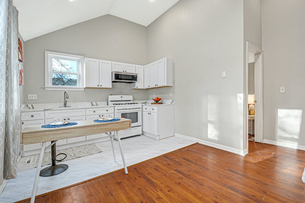 30 Nourse Road Bolton, MA 01740 - Photo 33 of 40 a kitchen with stainless steel appliances a sink a stove a refrigerator and cabinets