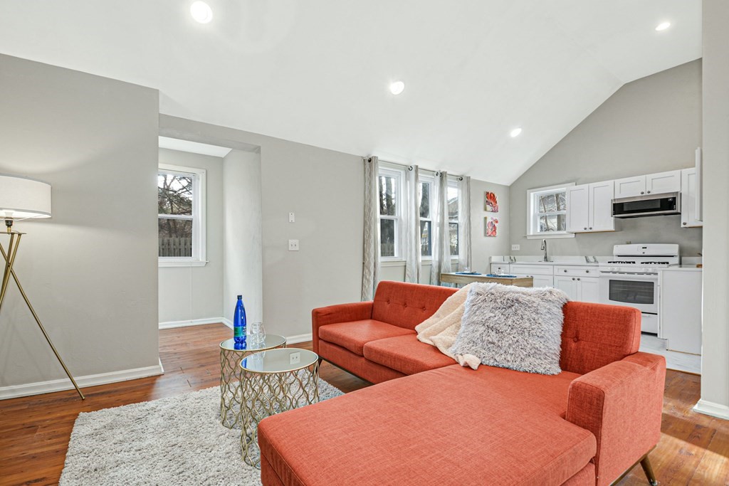 30 Nourse Road Bolton, MA 01740 - Photo 35 of 40 a living room with furniture and a wooden floor