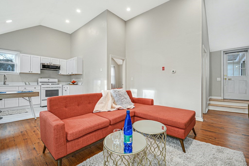 30 Nourse Road Bolton, MA 01740 - Photo 36 of 40 a living room with furniture and a wooden floor