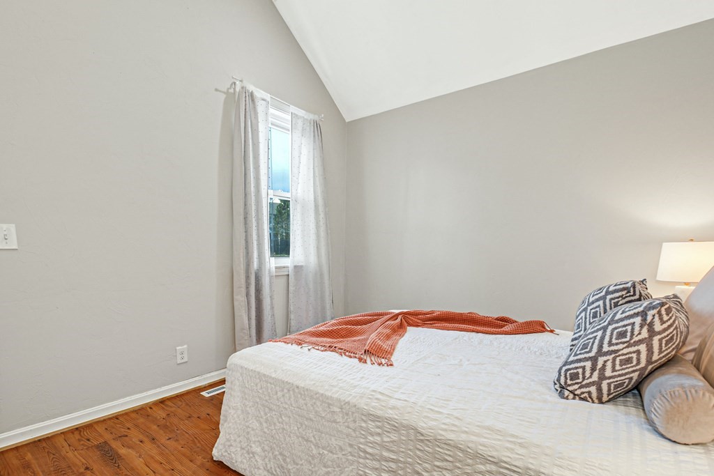 30 Nourse Road Bolton, MA 01740 - Photo 38 of 40 a bedroom with a bed and wooden floor