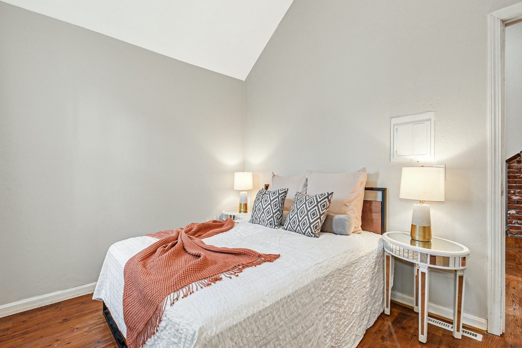 30 Nourse Road Bolton, MA 01740 - Photo 39 of 40 a bedroom with a bed and a lamp