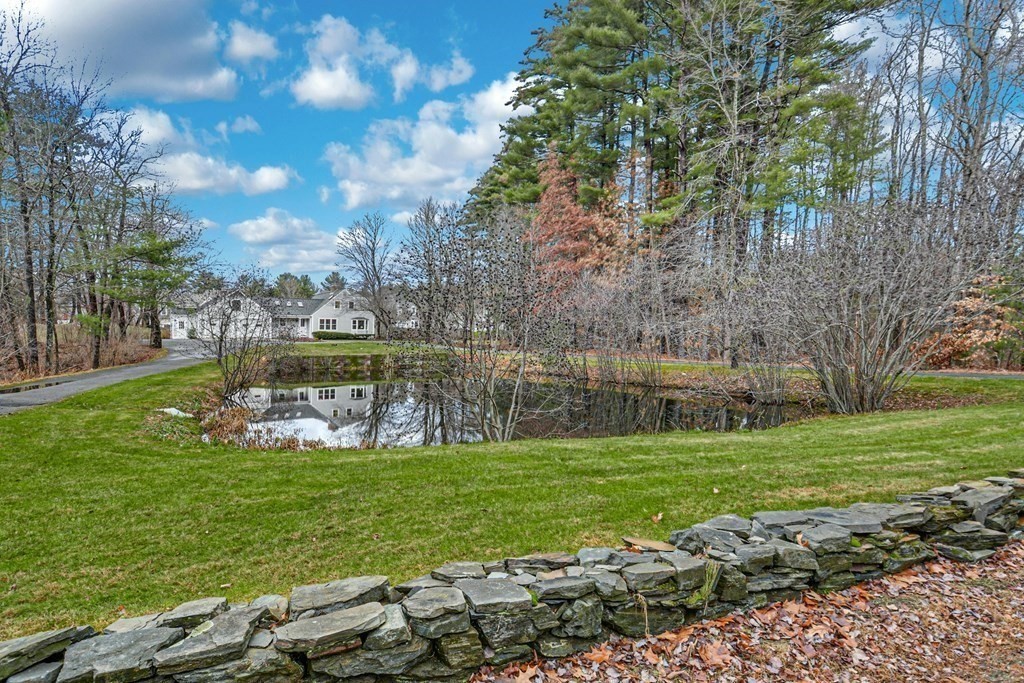30 Nourse Road Bolton, MA 01740 - Photo 4 of 40 a view of a lake with a big yard