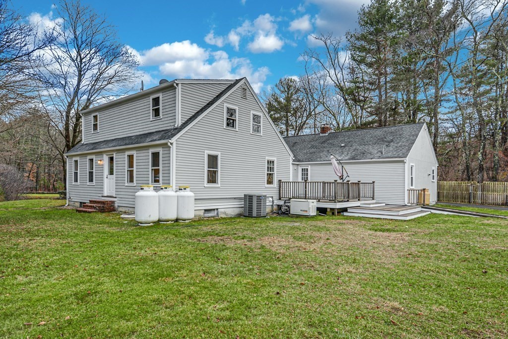 30 Nourse Road Bolton, MA 01740 - Photo 9 of 40 a view of a house with a yard and sitting area