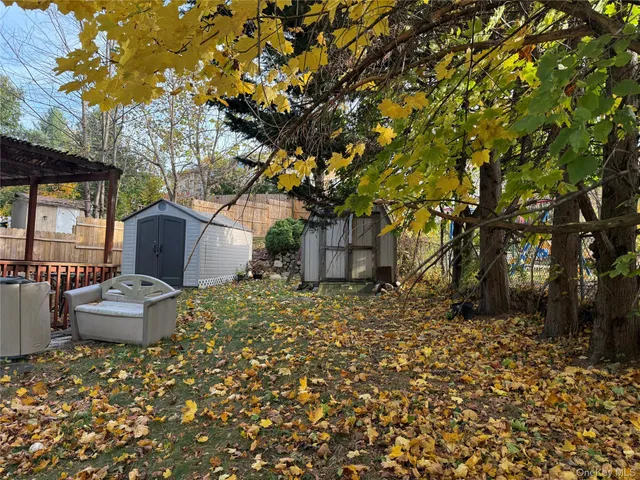 a view of a two chairs in the roof deck