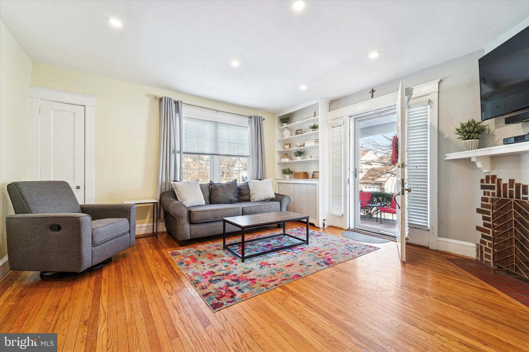 208 Harwicke Road Springfield, PA 19064 - Photo 6 of 25 a living room with furniture and a wooden floor