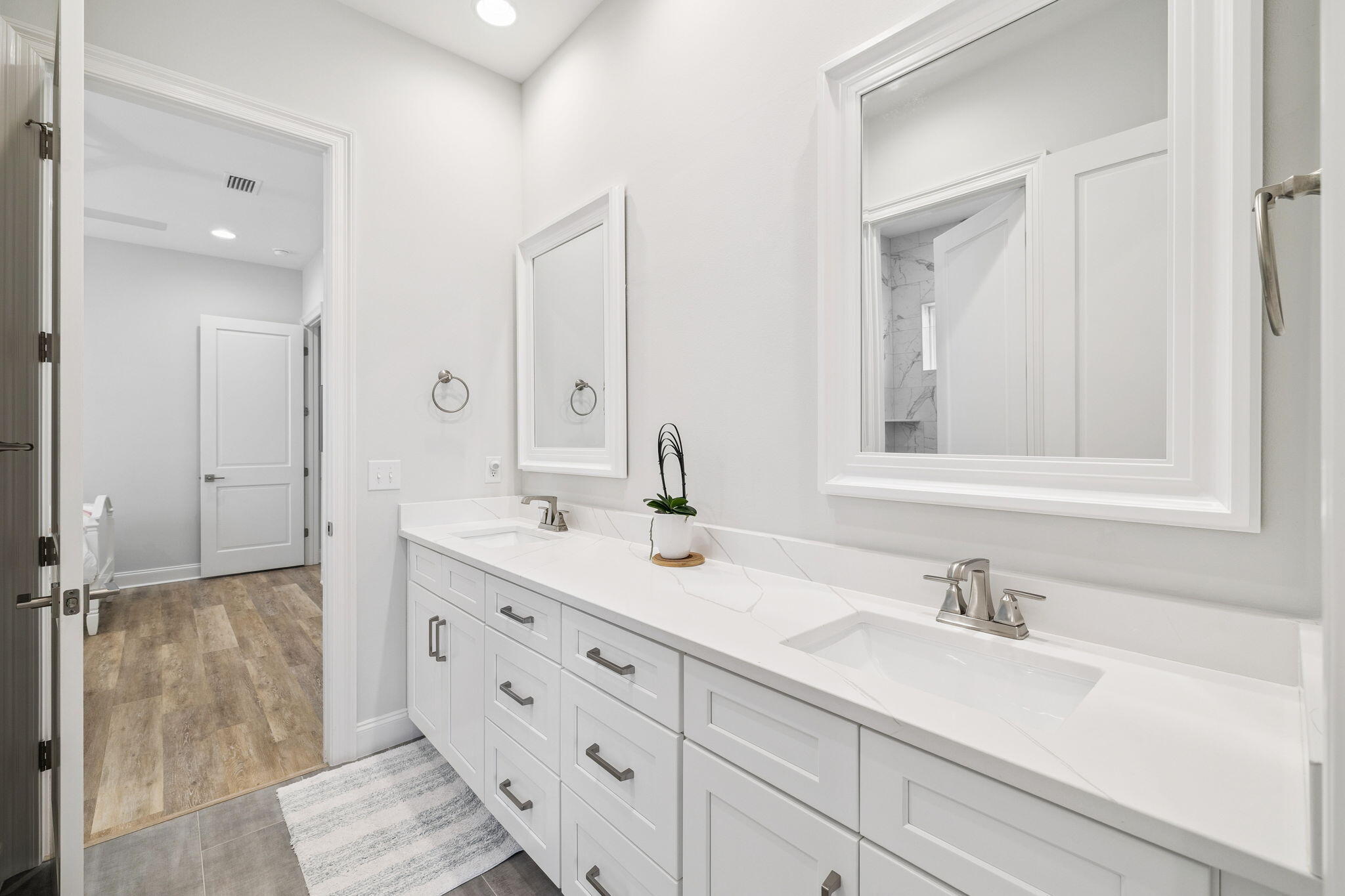 129 Suwannee Dr Inlet Beach Inlet Beach, FL 32461 - Photo 25 of 43 a bathroom with double sink and a mirror