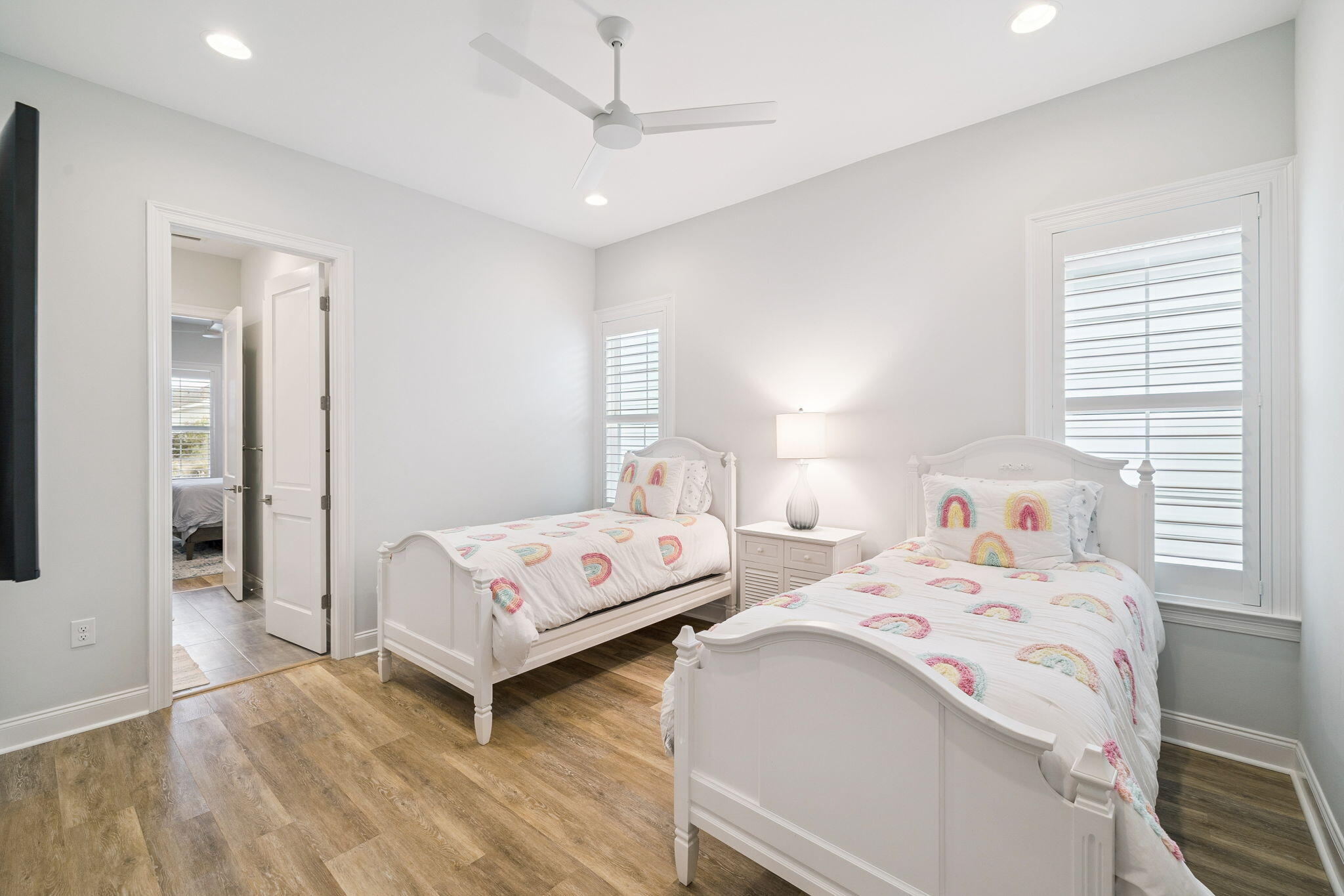 129 Suwannee Dr Inlet Beach Inlet Beach, FL 32461 - Photo 27 of 43 a bedroom with two beds and a chandelier