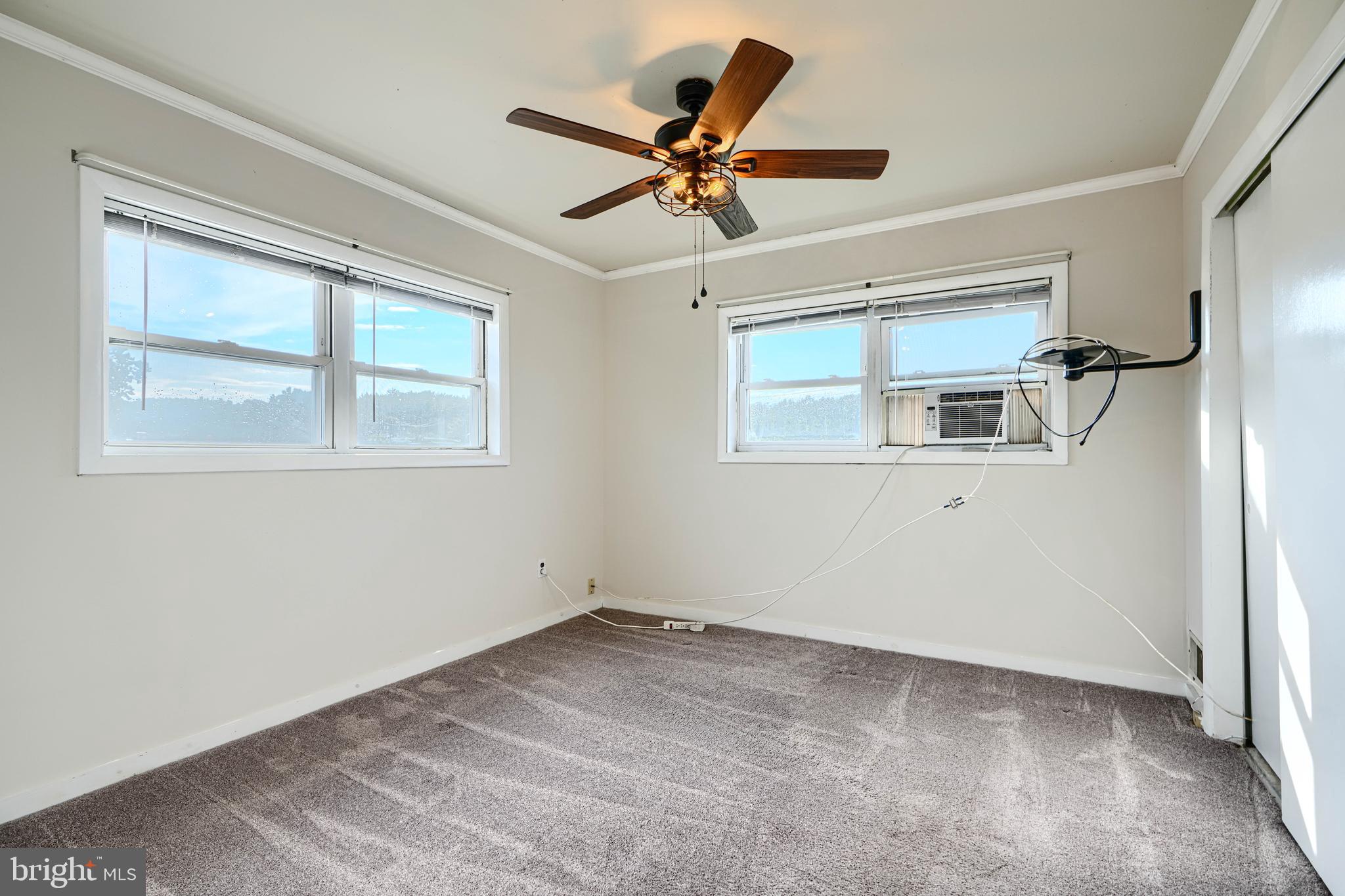 2 Haley Road Essex, MD 21221 - Photo 11 of 32 a view of a livingroom with a ceiling fan and window