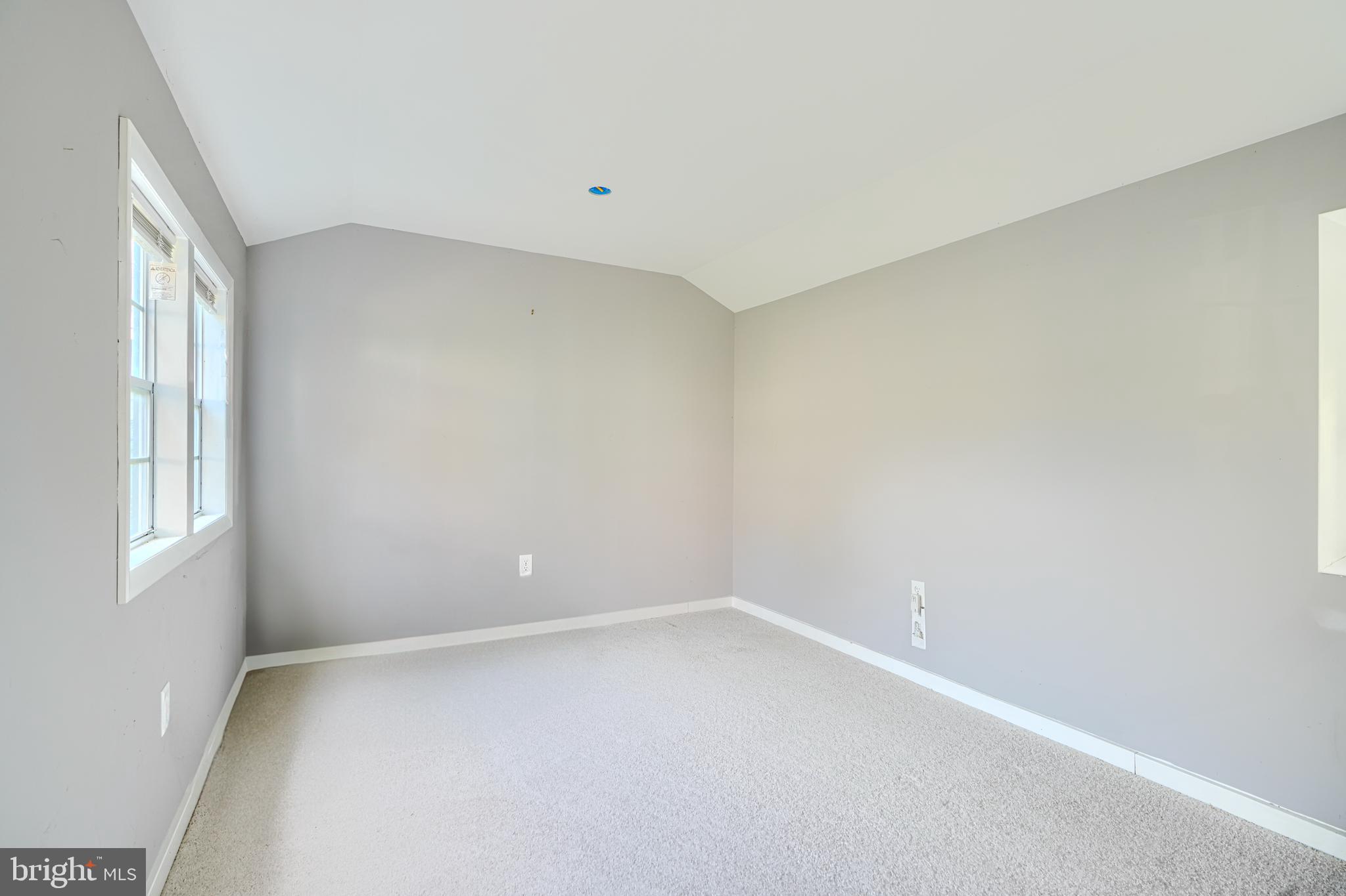 2 Haley Road Essex, MD 21221 - Photo 28 of 32 a view of an empty room with a window
