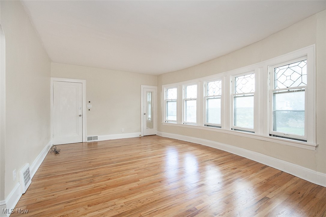3616 Hildana Road Cleveland, OH 44120 - Photo 12 of 27 Unfurnished room featuring light wood-style floors and baseboards